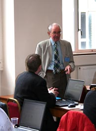 Professor Mike Ashby in discussion with a course attendee